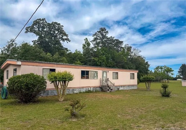 Photo 1 of Manufactured home for sale at 1308 Mac D Rd, Orrum, NC 28369 | MLS# 762609 | Listing updated on 2026-07-28