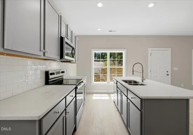 Photo 2 of Single family home for sale at 310 Chartres St, Fuquay Varina, NC 27526 | MLS# 10188435 | Listing updated on 2026-08-28