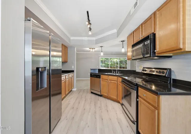 Photo 3 of Condo for sale at 7605 Falcon Rest Cir, Raleigh, NC 27615 | MLS# 10170519 | Listing updated on 2026-07-18