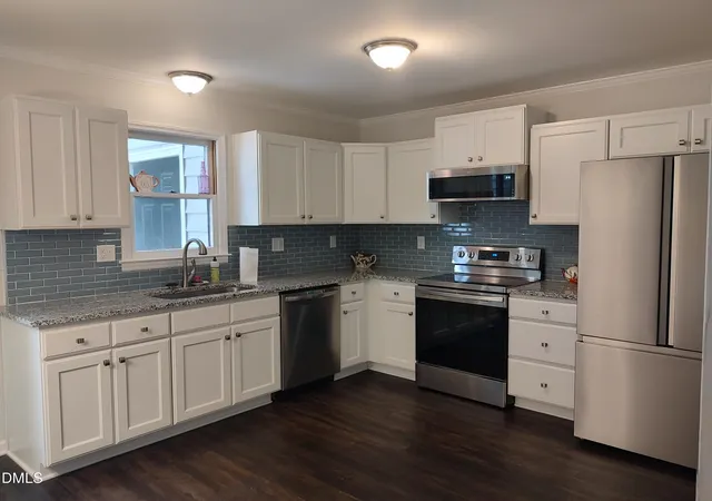 Photo 2 of Townhouse for sale at 6551 Hearthstone Dr, Raleigh, NC 27615 | MLS# 10170336 | Listing updated on 2026-08-04
