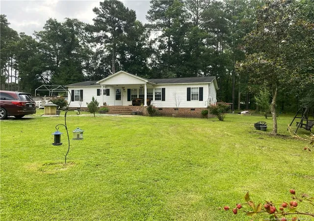 Photo 2 of Manufactured home for sale at 2100 Norment Rd, Lumberton, NC 28360 | MLS# 763498 | Listing updated on 2026-07-24