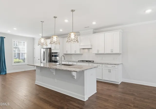 Photo 3 of Sale Pending at 8403 Garnet Rose Ln, Raleigh, NC 27615 | MLS# 10172452 | Listing updated on 2026-10-13