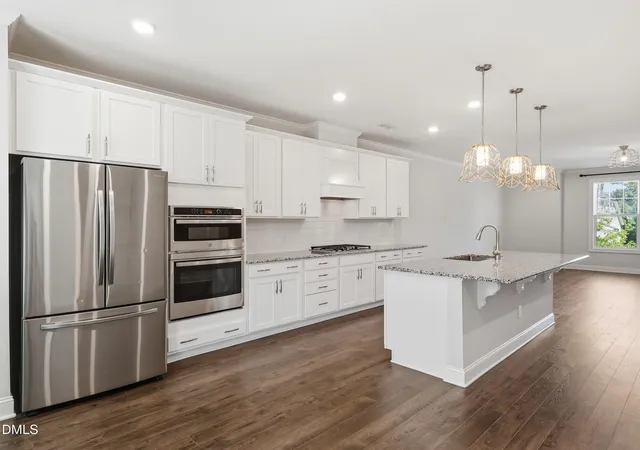 Photo 4 of Sale Pending at 8403 Garnet Rose Ln, Raleigh, NC 27615 | MLS# 10172452 | Listing updated on 2026-10-13