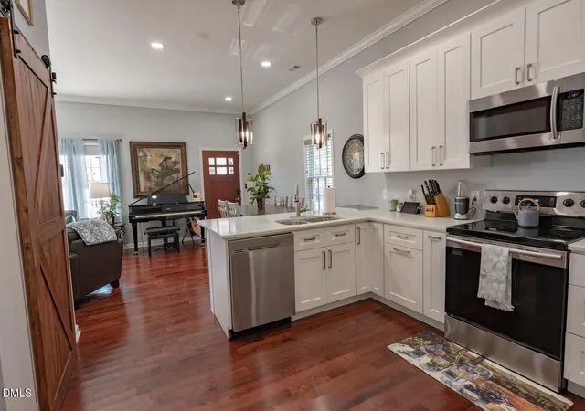 Photo 3 of Single family home for sale at 213 E South St, Raleigh, NC 27601 | MLS# 10174213 | Listing updated on 2026-07-20