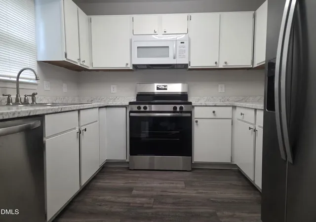Photo 3 of Townhouse for sale at 1900 Township Cir, Raleigh, NC 27609 | MLS# 10182881 | Listing updated on 2026-08-12