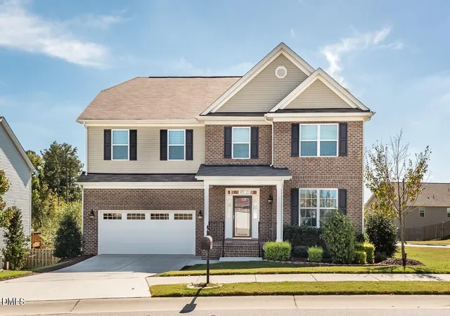 Photo 1 of Single family home for sale at 215 Holly Blossom Dr, Durham, NC 27703 | MLS# 10177183 | Listing updated on 2026-07-18