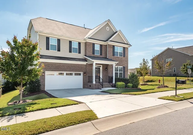 Photo 3 of Single family home for sale at 215 Holly Blossom Dr, Durham, NC 27703 | MLS# 10177183 | Listing updated on 2026-07-18