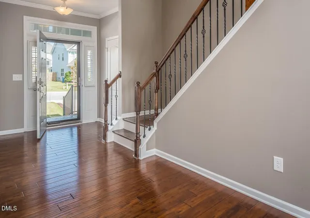 Photo 3 of Single family home for sale at 215 Holly Blossom Dr, Durham, NC 27703 | MLS# 10177183 | Listing updated on 2026-07-18