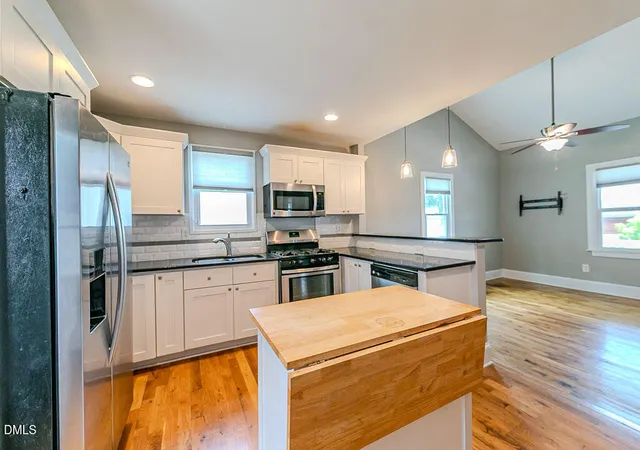Photo 3 of Single family home for sale at 410 Bledsoe Ave, Raleigh, NC 27601 | MLS# 10178808 | Listing updated on 2026-07-21