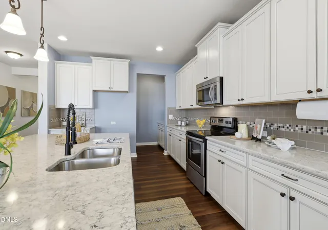 Photo 4 of Single family home for sale at 301 Atwood Dr, Holly Springs, NC 27540 | MLS# 10178881 | Listing updated on 2026-10-08