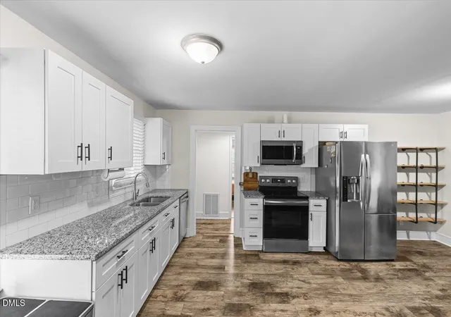 Photo 4 of Single family home for sale at 1014 E Club Blvd, Durham, NC 27704 | MLS# 10180558 | Listing updated on 2026-10-08