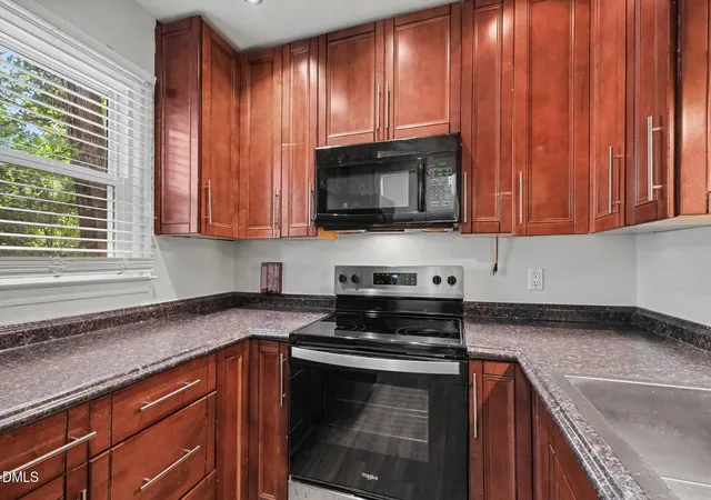 Photo 3 of Condo for sale at 913 Hearthridge Ct #A, Raleigh, NC 27609 | MLS# 10181158 | Listing updated on 2026-09-18