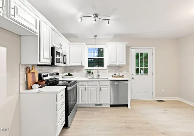 Photo 4 of Single family home for sale at 105 Poplar Ct, Willow Spring, NC 27592 | MLS# 10182436 | Listing updated on 2026-09-10