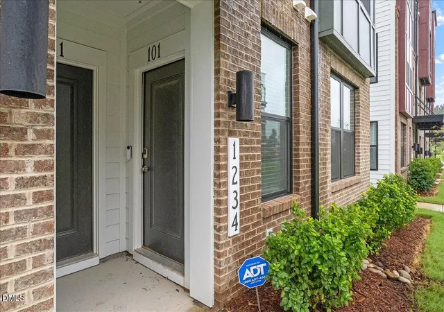 Photo 2 of Condo for sale at 1234 Coach Sta Aly #101, Raleigh, NC 27601 | MLS# 10182496 | Listing updated on 2026-10-02