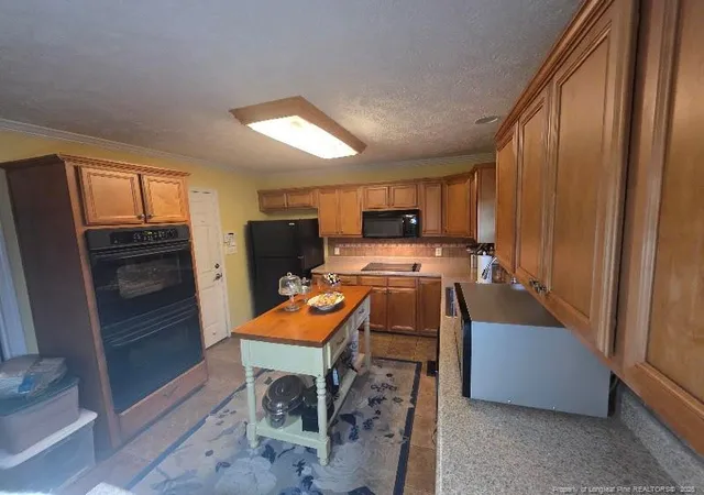 Photo 4 of Single family home for sale at 1102 Reflex St, Fayetteville, NC 28311 | MLS# 766518 | Listing updated on 2026-09-20