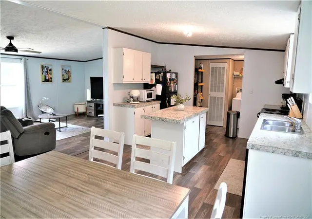 Photo 4 of Manufactured home for sale at 3927 Mckethan St, Wade, NC 28395 | MLS# 766889 | Listing updated on 2026-09-02