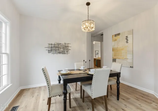 Photo 3 of Single family home for sale at 8825 Deerland Grv Dr, Raleigh, NC 27615 | MLS# 10183893 | Listing updated on 2026-09-16