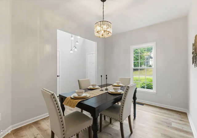 Photo 4 of Single family home for sale at 8825 Deerland Grv Dr, Raleigh, NC 27615 | MLS# 10183893 | Listing updated on 2026-09-16