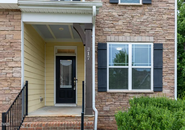 Photo 2 of Single family home for sale at 317 Springhurst Ln, Cary, NC 27511 | MLS# 10184624 | Listing updated on 2026-09-06
