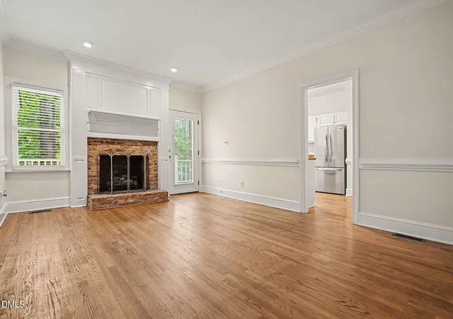Photo 4 of Townhouse for sale at 1304 Hampshire Ct, Raleigh, NC 27612 | MLS# 10184821 | Listing updated on 2026-09-24