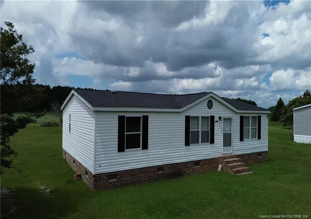 Manufactured home for sale at 3898 Alamac Rd, Lumberton, NC 28358 | MLS# 767428