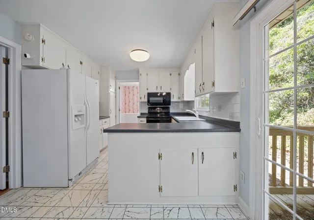 Photo 4 of Single family home for sale at 2204 Hillock Dr, Raleigh, NC 27612 | MLS# 10185358 | Listing updated on 2026-09-01