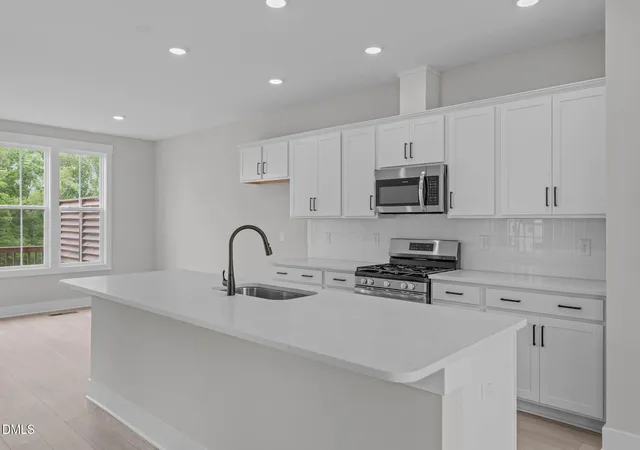 Photo 3 of Townhouse for sale at 501 Plumleaf Ln, Durham, NC 27703 | MLS# 10185619 | Listing updated on 2026-10-20