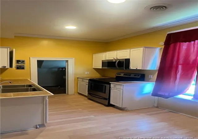 Photo 2 of Single family home for sale at 307 E Mitchell St, Fairmont, NC 28340 | MLS# 767329 | Listing updated on 2026-09-03