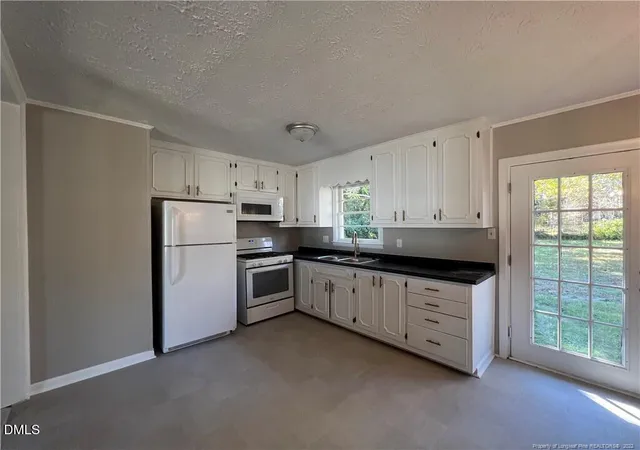 Photo 4 of Single family home for sale at 2602 Sedgefield Dr, Fayetteville, NC 28306 | MLS# 10187003 | Listing updated on 2026-10-08