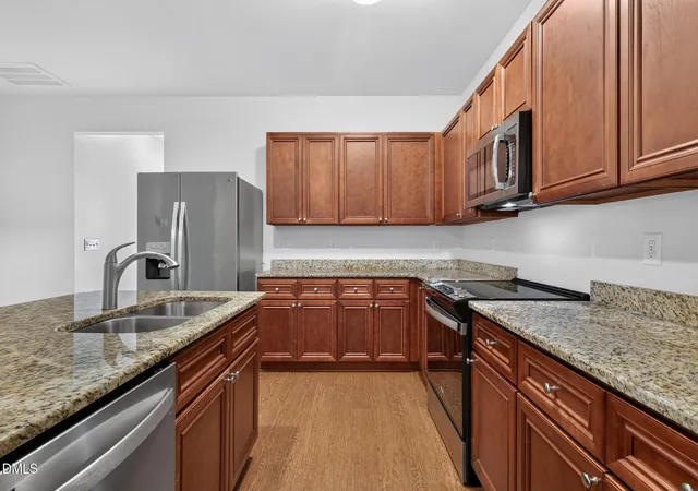Photo 4 of Townhouse for sale at 3932 Volkswalk Pl, Raleigh, NC 27610 | MLS# 10186815 | Listing updated on 2026-09-18