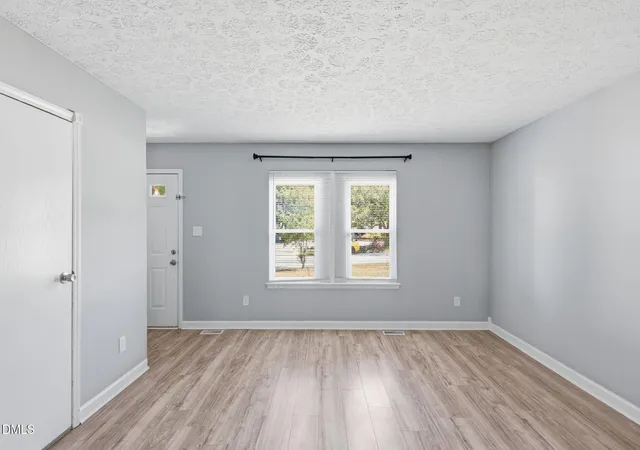Photo 3 of Single family home for sale at 8213 Wynewood Ct, Raleigh, NC 27616 | MLS# 10188405 | Listing updated on 2026-09-17