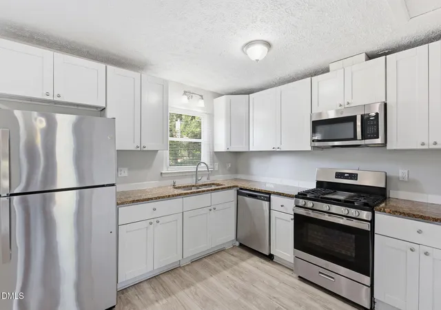 Photo 4 of Single family home for sale at 8213 Wynewood Ct, Raleigh, NC 27616 | MLS# 10188405 | Listing updated on 2026-10-16