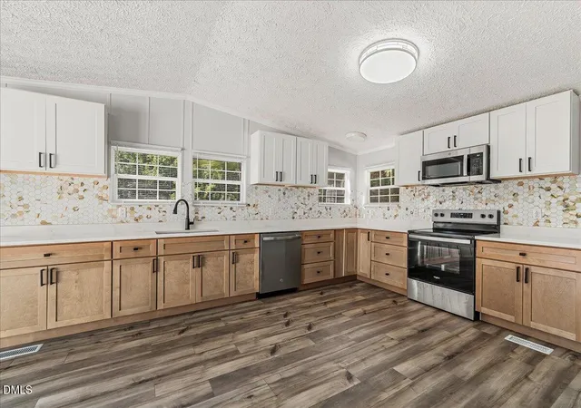 Photo 3 of Single family home for sale at 424 Bowman Ln, Henderson, NC 27537 | MLS# 10188811 | Listing updated on 2026-08-27