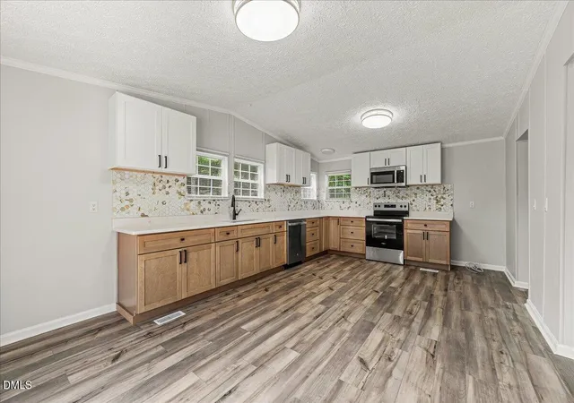 Photo 5 of Single family home for sale at 424 Bowman Ln, Henderson, NC 27537 | MLS# 10188811 | Listing updated on 2026-08-27