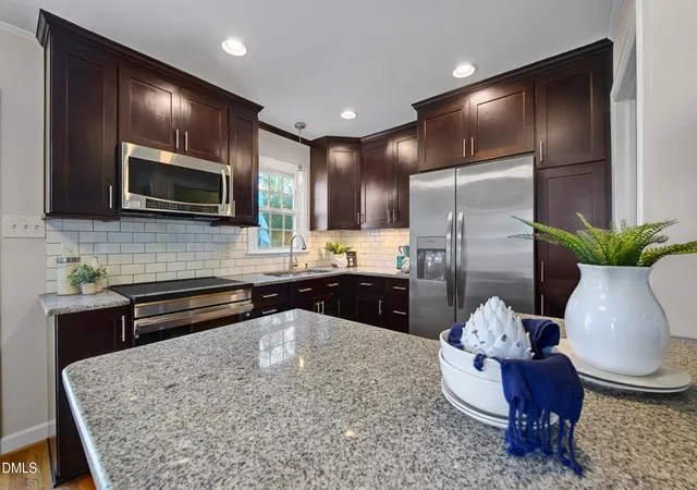 Photo 3 of Single family home for sale at 2612 Barmettler St, Raleigh, NC 27607 | MLS# 10189216 | Listing updated on 2026-09-14