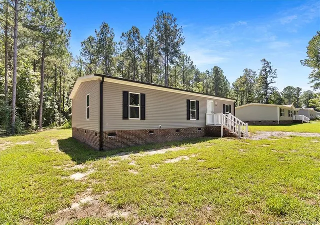 Photo 2 of Manufactured home for sale at 4523 Mercer Mill Brown Marsh Rd, Clarkton, NC 28433 | MLS# 768414 | Listing updated on 2026-08-27