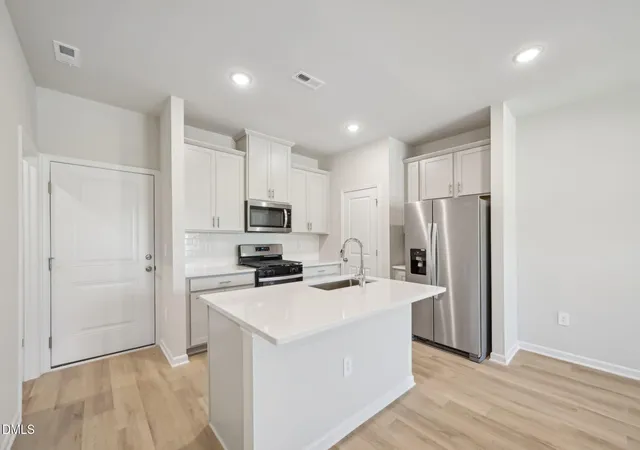 Photo 4 of Townhouse for sale at 6055 Spring Forest Rd, Raleigh, NC 27616 | MLS# 10189340 | Listing updated on 2026-09-15