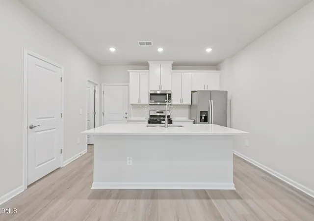Photo 4 of Townhouse for sale at 6057 Spring Forest Rd, Raleigh, NC 27616 | MLS# 10189363 | Listing updated on 2026-09-15