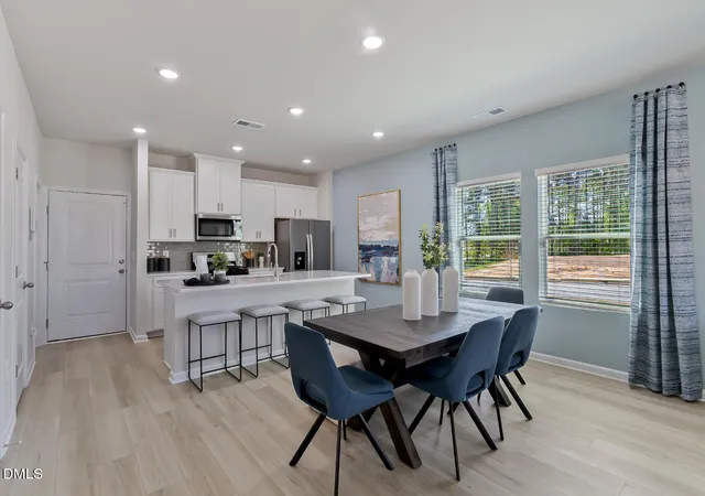 Photo 3 of Townhouse for sale at 6059 Spring Forest Rd, Raleigh, NC 27616 | MLS# 10189378 | Listing updated on 2026-09-15