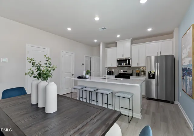 Photo 3 of Townhouse for sale at 6059 Spring Forest Rd, Raleigh, NC 27616 | MLS# 10189378 | Listing updated on 2026-09-15