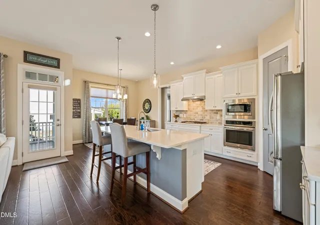 Photo 4 of Single family home for sale at 409 Quaker Meadows Ct, Holly Springs, NC 27540 | MLS# 10200879 | Listing updated on 2026-10-29