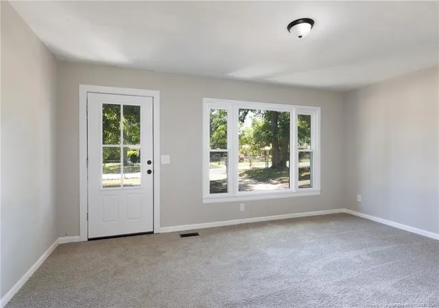 Photo 2 of Single family home for sale at 1034 Riverside Cir, Spring Lake, NC 28390 | MLS# 762379 | Listing updated on 2026-05-11