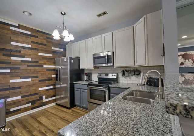 Photo 3 of Townhouse for sale at 411 Coalinga Ln, Raleigh, NC 27610 | MLS# 10150668 | Listing updated on 2026-04-23