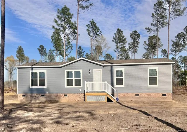 Photo 1 of Manufactured home for sale at 1452 Mercer Ml Rd, Lumberton, NC 28358 | MLS# 758212 | Listing updated on 2026-05-05