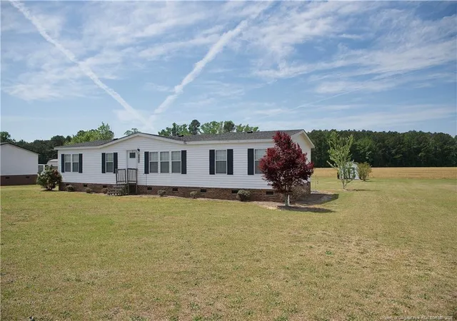 Photo 2 of Manufactured home for sale at 1071 Watts Rd, Lumberton, NC 28360 | MLS# 760887 | Listing updated on 2026-04-16