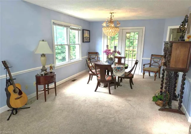 Photo 3 of Single family home for sale at 2014 Hearthwood Ct, Greensboro, NC 27407 | MLS# 1233998 | Listing updated on 2026-09-28
