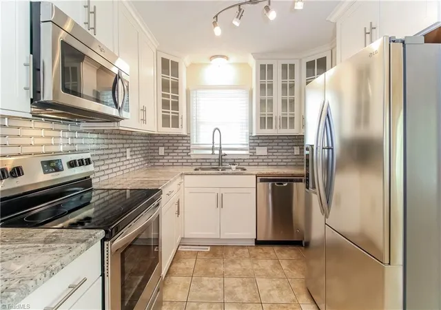 Photo 3 of Single family home for sale at 5406 Chatfield Sq, Greensboro, NC 27410 | MLS# 1233054 | Listing updated on 2026-10-07