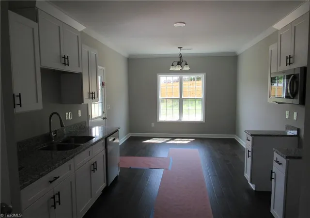 Photo 4 of Single family home for sale at 2212 Cleveland Ave, Winston Salem, NC 27105 | MLS# 1185246 | Listing updated on 2026-09-14