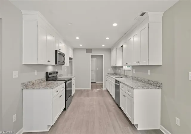 Photo 3 of Single family home for sale at 1607 N Cleveland Ave, Winston Salem, NC 27105 | MLS# 1191706 | Listing updated on 2026-09-17