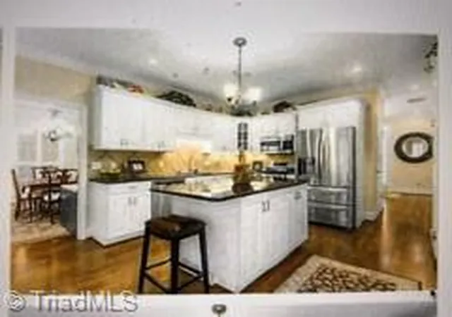Photo 4 of Single family home for sale at 18 Windrock Way, Greensboro, NC 27455 | MLS# 1228583 | Listing updated on 2026-10-07